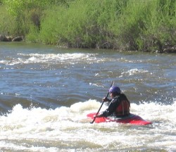 Kayaker in white water of Arkansas River