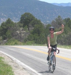 Friend Kelley reaches the top during a ride outside Salida